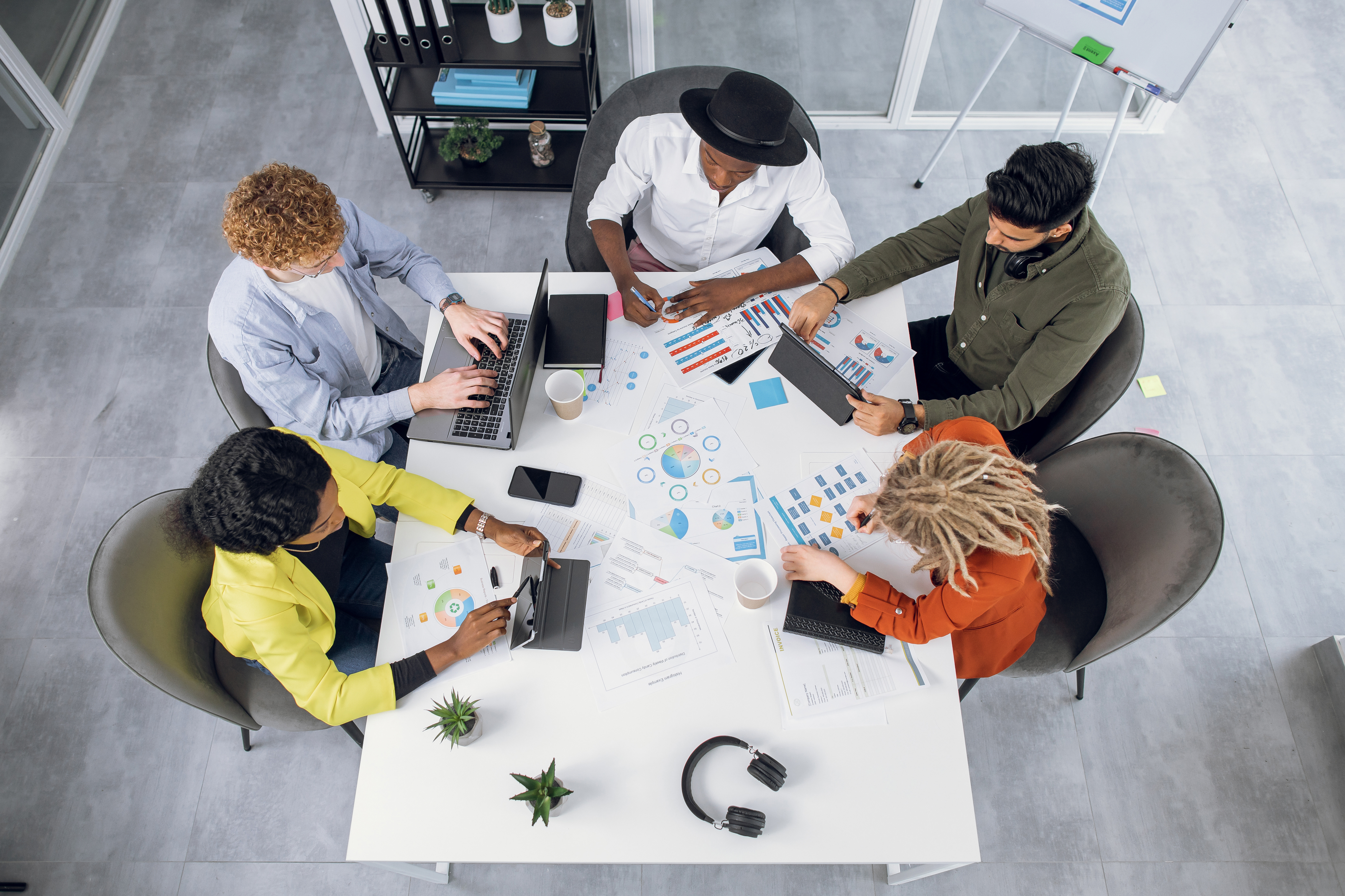 Employees collaborating around a table in an office