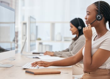 Business women consulting on computer in modern office for website IT support