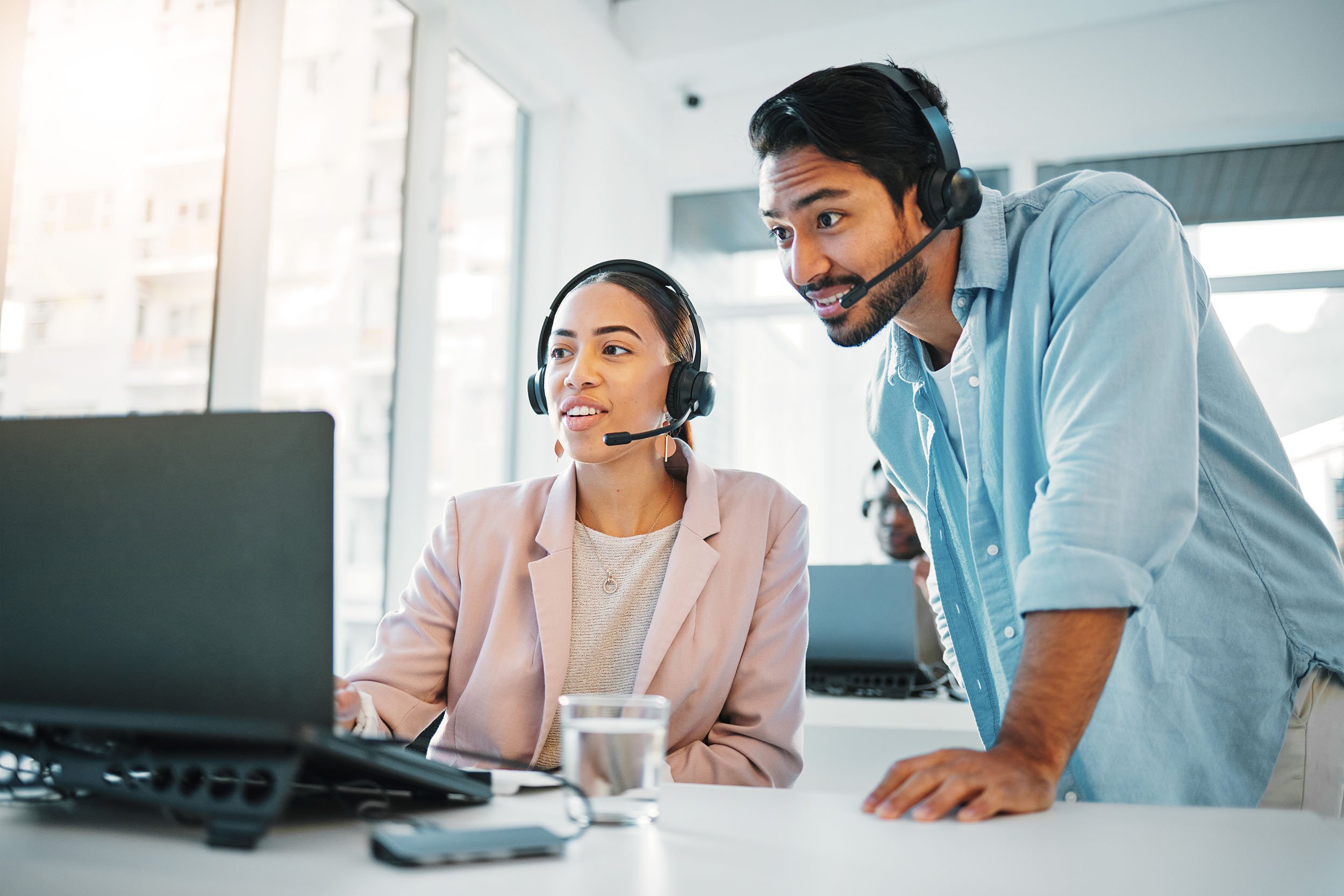 People at call center training with manager