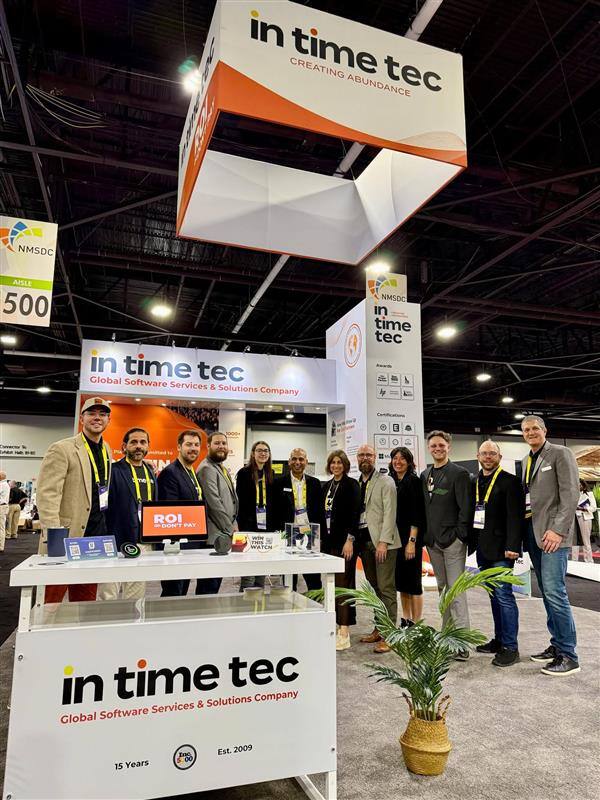 In Time Tec group photo at NMSDC booth