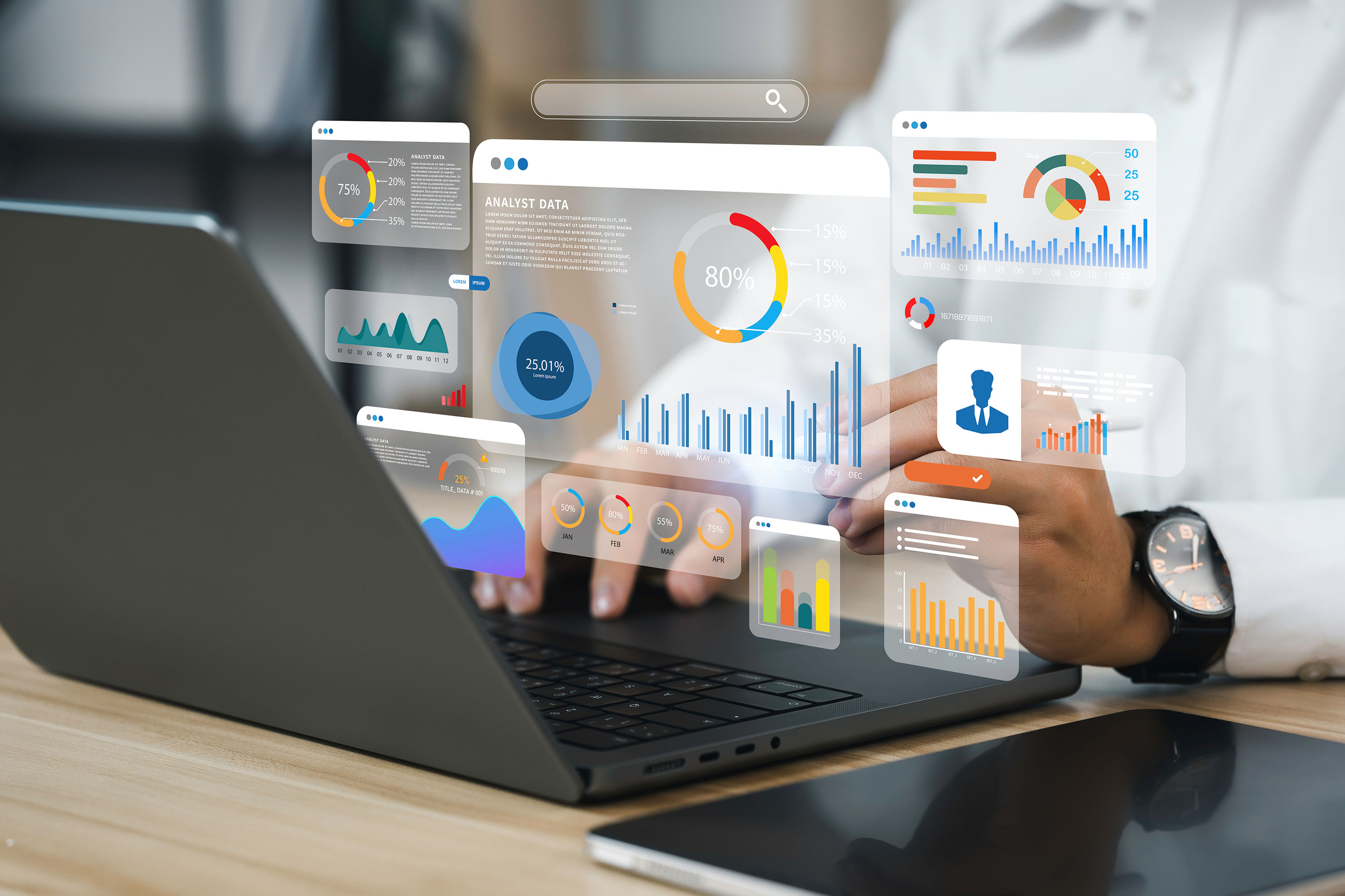 An analyst uses a computer and dashboard for data business analysis